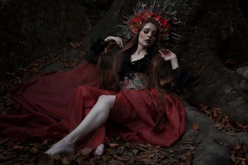 Barefoot Woman with Floral Wreath in Forest