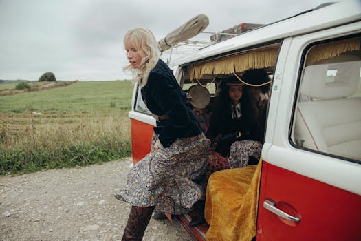 Woman getting out of a vintage van on a country road, embracing travel vibes.