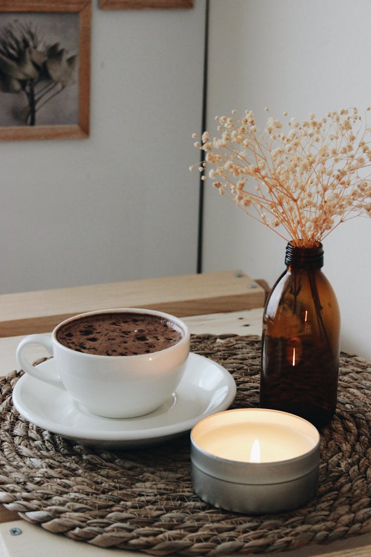 Coffee In Cup At Table At Home