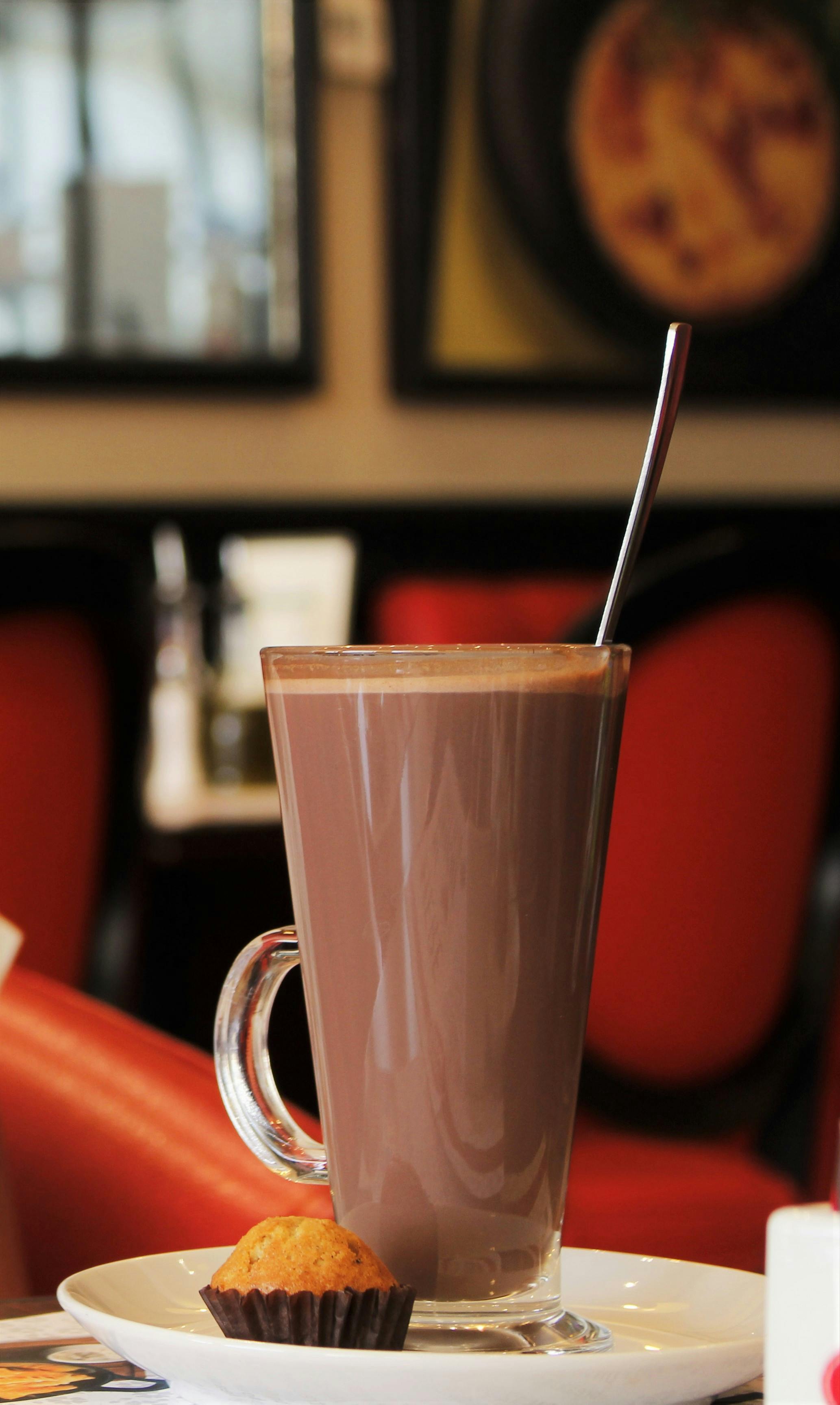 white ceramic mug with stainless steel spoon