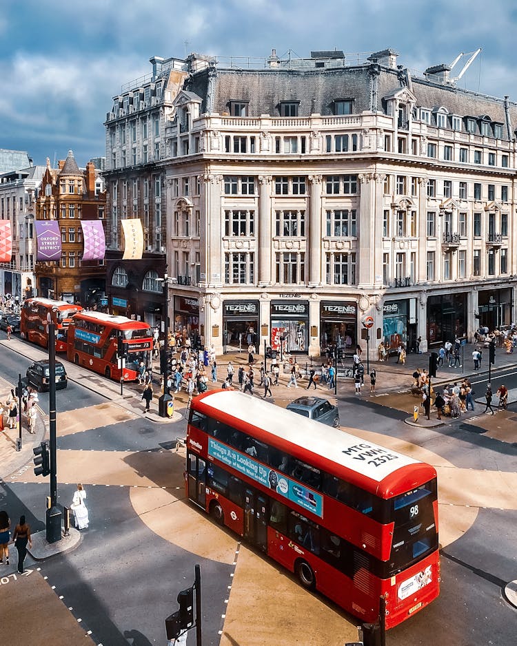 Red Double Decker Buses On Road