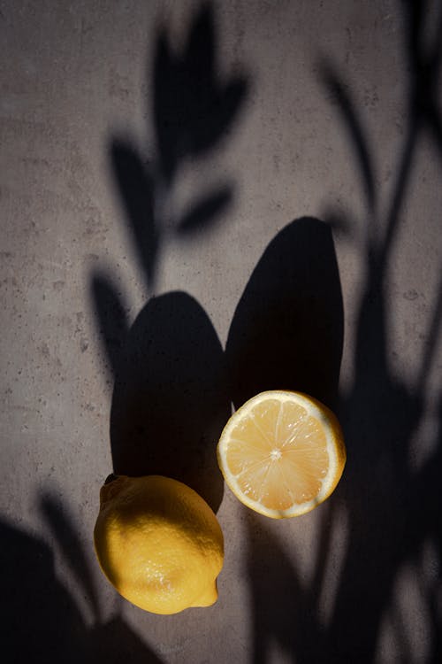 Free A Lemon Fruits on a Concrete Surface Stock Photo
