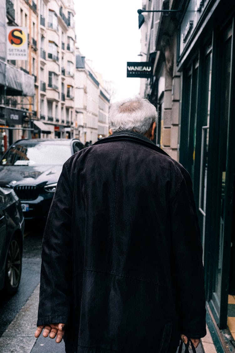 Back View An Elderly Man Walking