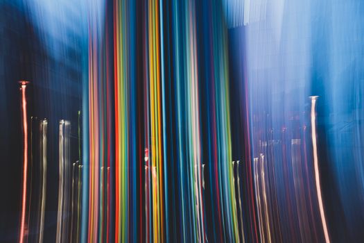 Dynamic photo of colorful light streaks creating vibrant abstract patterns.
