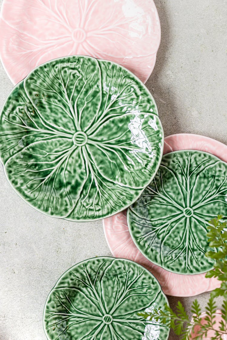 Gree And Pink Plates With Leaves Design