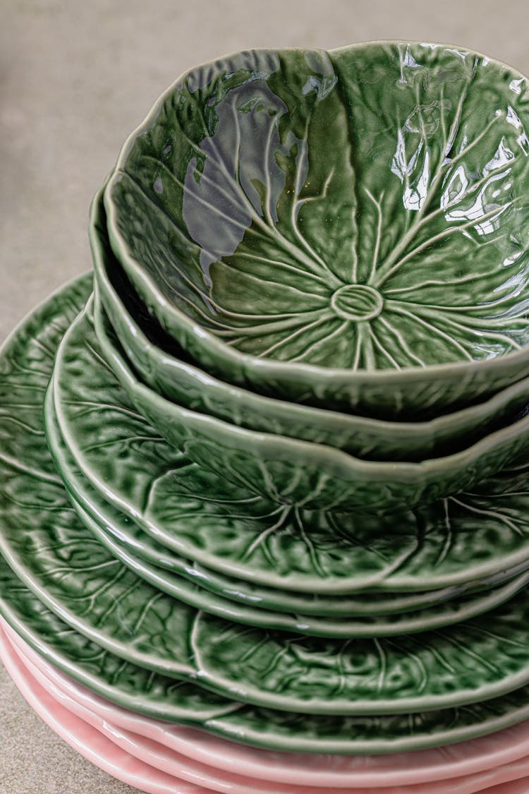 Close-up Photo Of Stacked Plates And Bowls