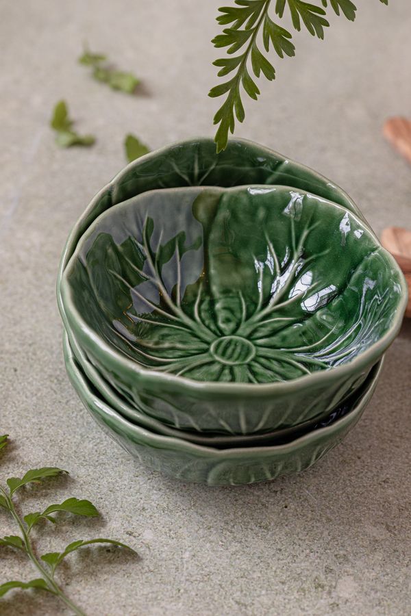 Stacked green ceramic bowls — Micheile Henderson on Pexels