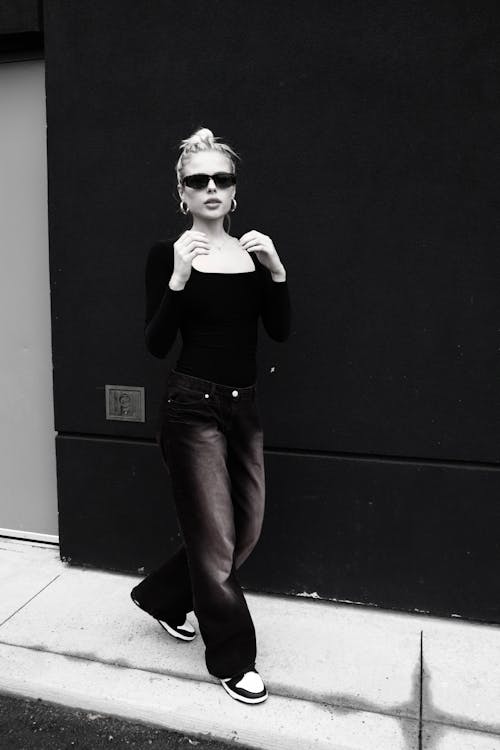Black and White Photo of a Woman Wearing Sunglasses · Free Stock Photo