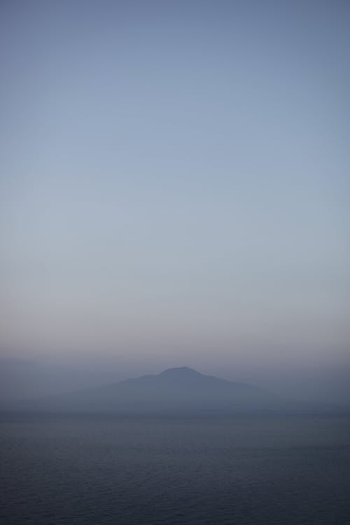 View of Water and an Island in the Horizon 