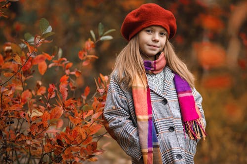 Free A Girl in Red Beret and Colorful Scarf Stock Photo
