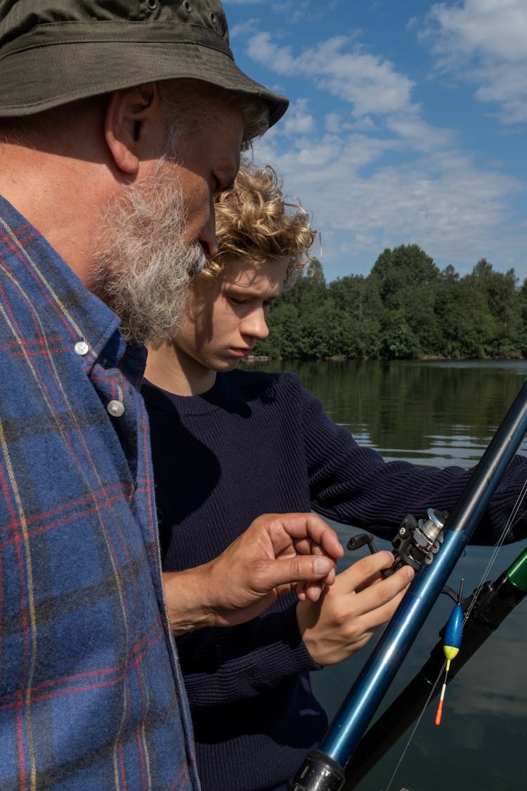 Grandfather And Grandson Fishing