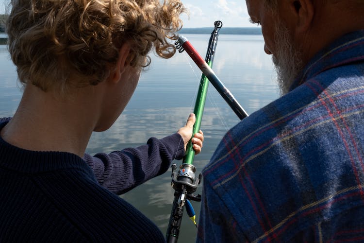 Grandfather And Grandson Fishing