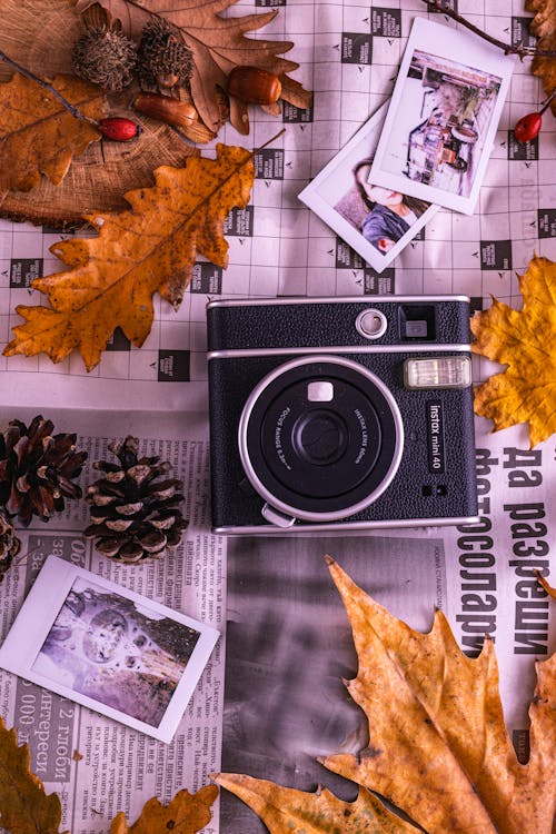 Vintage Camera on a Newspaper · Free Stock Photo