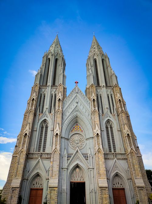 Free Low angle view of St. Philomena's Cathedral against a blue sky in Mysore, India. Stock Photo