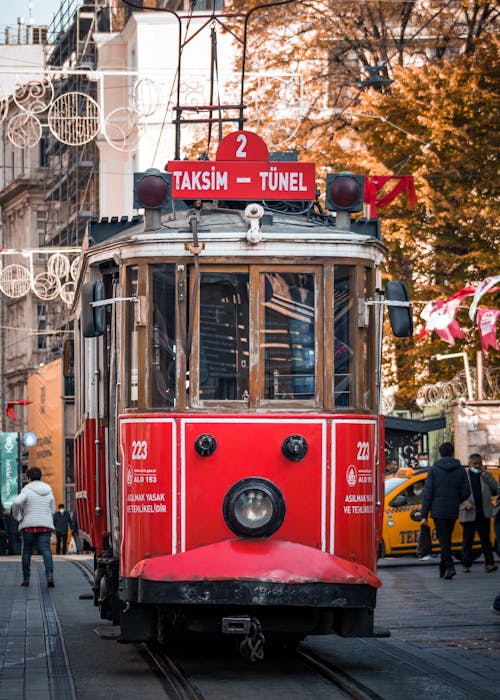 Free Red and White Tram on the Street Stock Photo