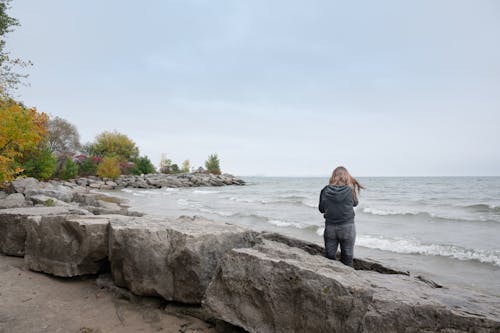 Woman Standing on the Shore