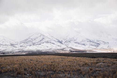 Free Snow Capped Mountain under a White Sky Stock Photo