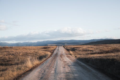 Kostnadsfri bild av grässlätt, kullar, landskap