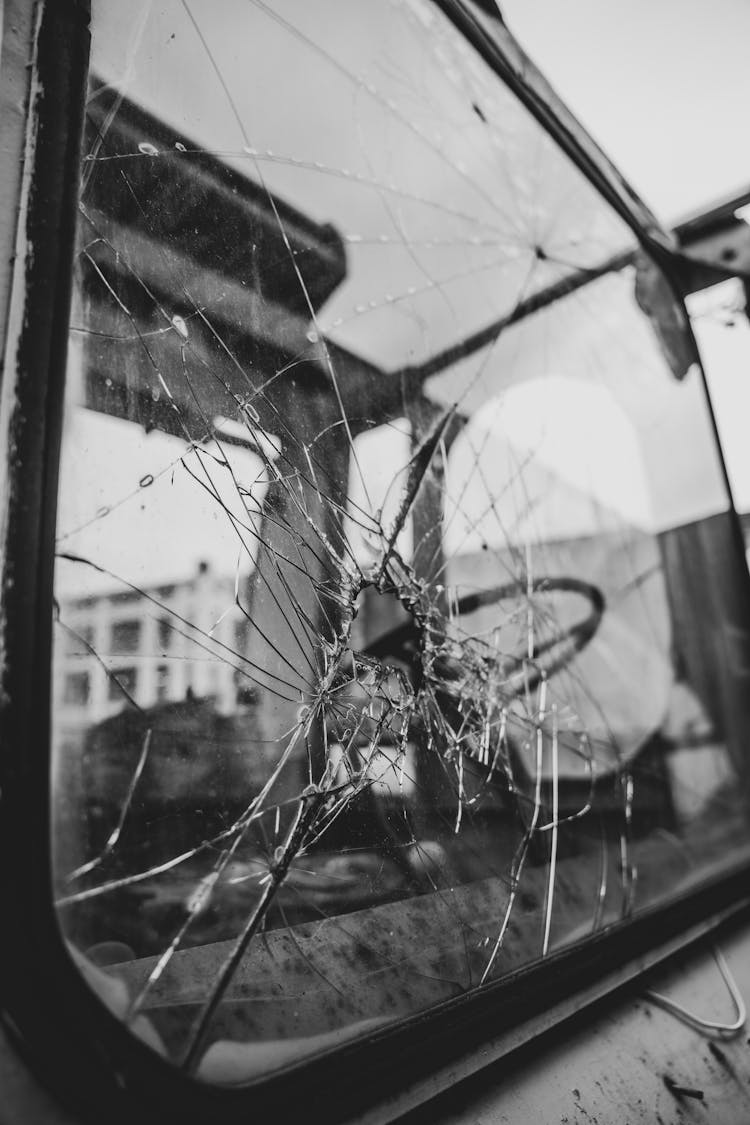 Close-up Of A Smashed Bus Windshield