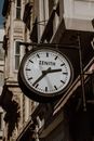 Black and White Round Analog Clock at 10 00