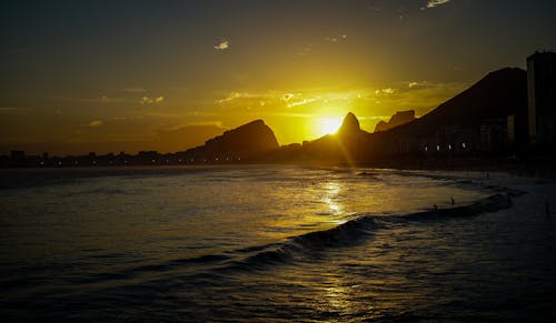 Free stock photo of beach sunset, evening sun, summer fun