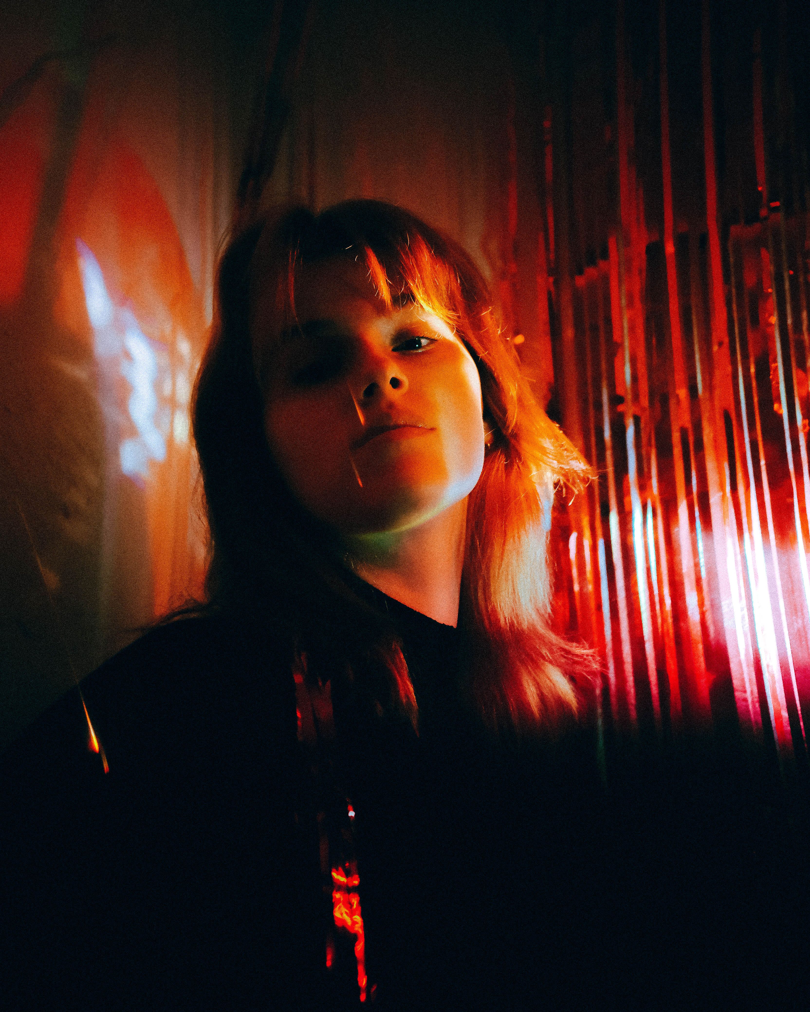 Woman Posing in Darkness · Free Stock Photo