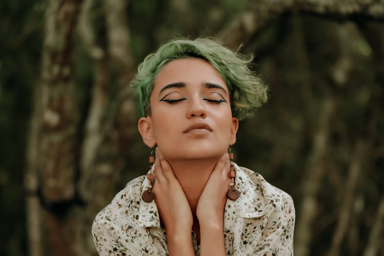 Eccentric Woman With Green Hair In Nature