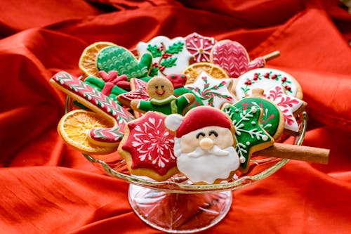 Glass Pedestal  with Assorted Gingerbreads on Red Textile