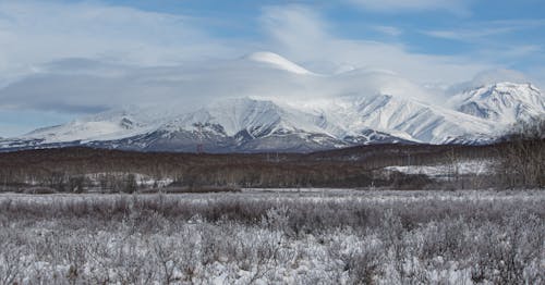 Snow Covered Mountains Under Blue Sky