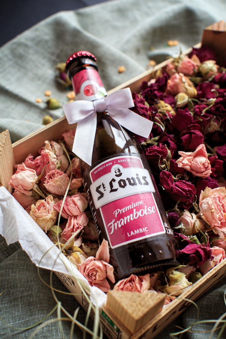 Beer Bottle In Box With Flowers