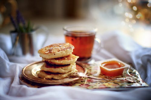 Free Pancakes with Honey and Tea Stock Photo