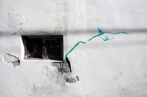 Sliding Window on White Concrete Wall