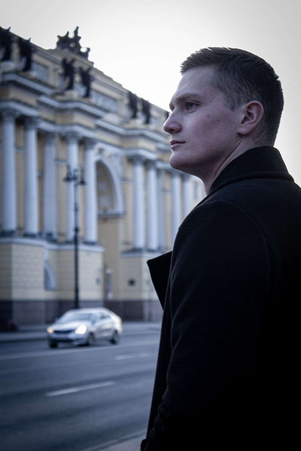 A Man in Black Suit Standing Near a Road · Free Stock Photo