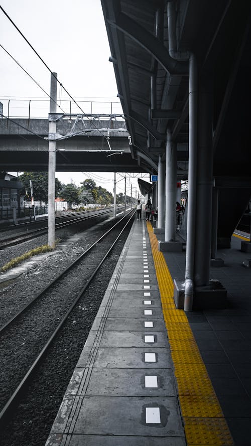 Безкоштовне стокове фото на тему «вертикальні постріл, залізнична колія, Залізничний вокзал»