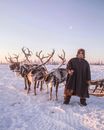 Man with Reindeer Sleigh in Snowy Yamal, Siberia, Russia