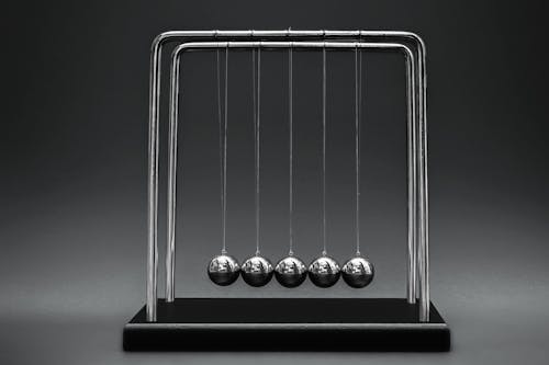 Free Close-up Photo of a Newton's Cradle Stock Photo
