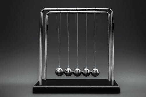 Close-up Photo of a Newton's Cradle