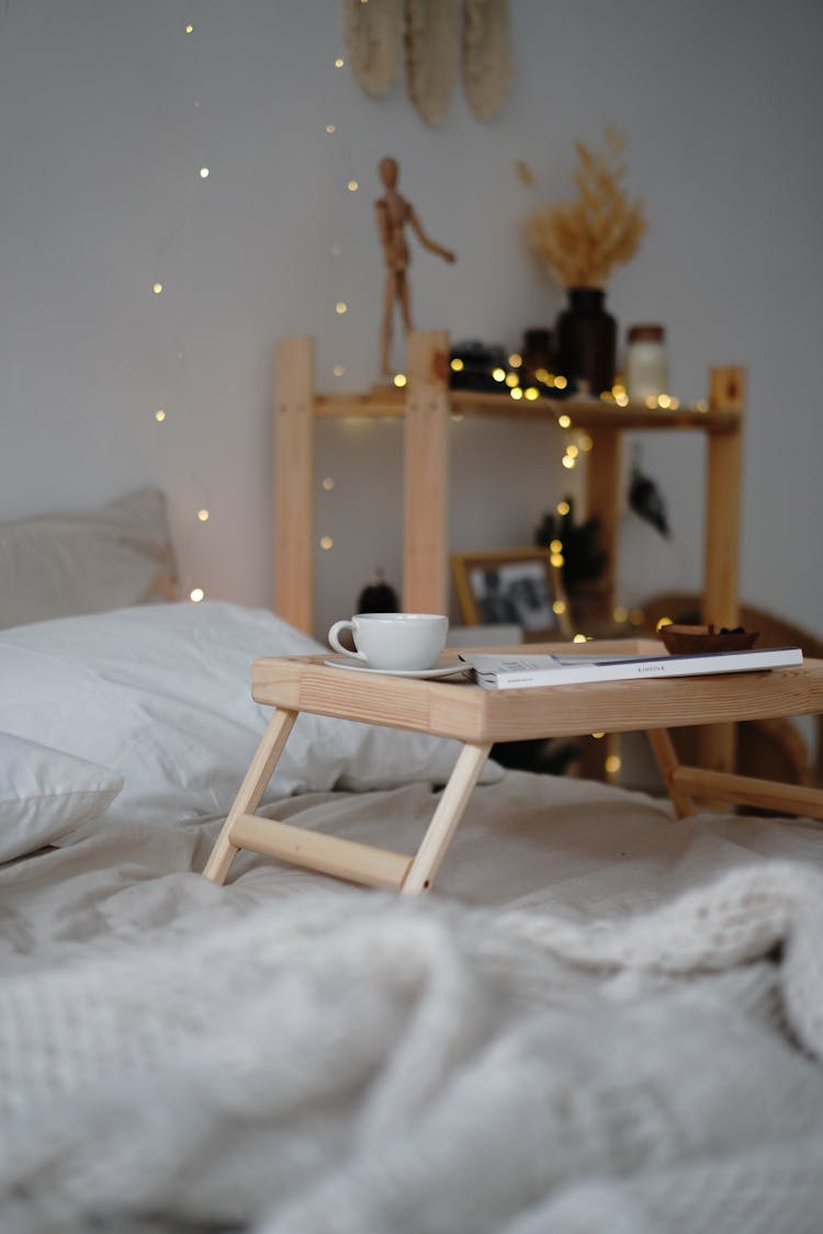 Breakfast In Bed In Boho Style Bedroom 