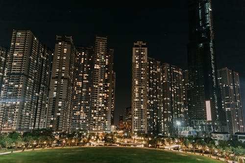Free Lightened High Rise Buildings at Night Time Stock Photo