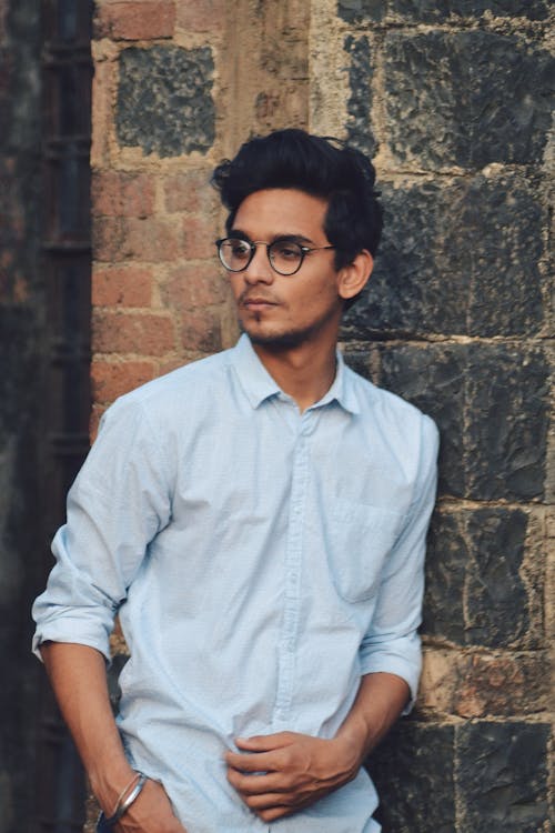 Man Wearing Blue Button-up Dress Shirt