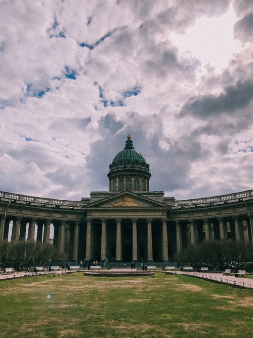 Free Majestic view of Kazan Cathedral against a dramatic cloudy sky in Saint Petersburg. Stock Photo