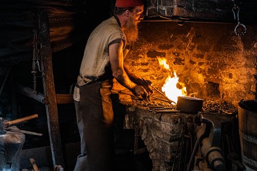Free A Blacksmith at Work Stock Photo