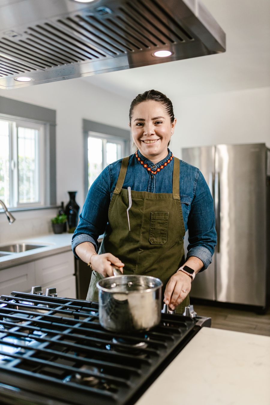 Cook in a home kitchen, photo by RDNE Stock project on Pexels