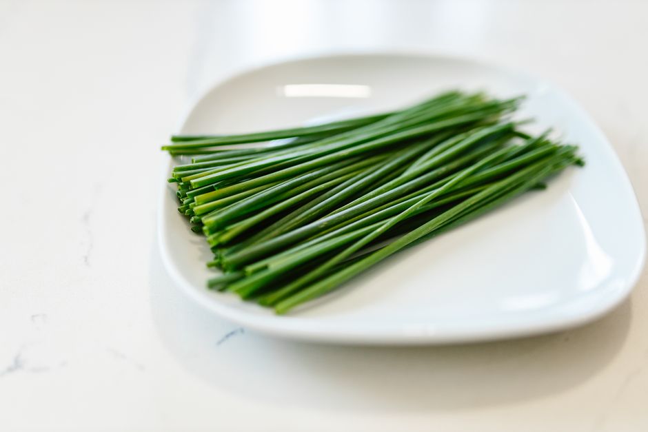 What chives are, the best substitutes with ratios, how to store them so they don't wilt, and how to use them without losing their flavor.