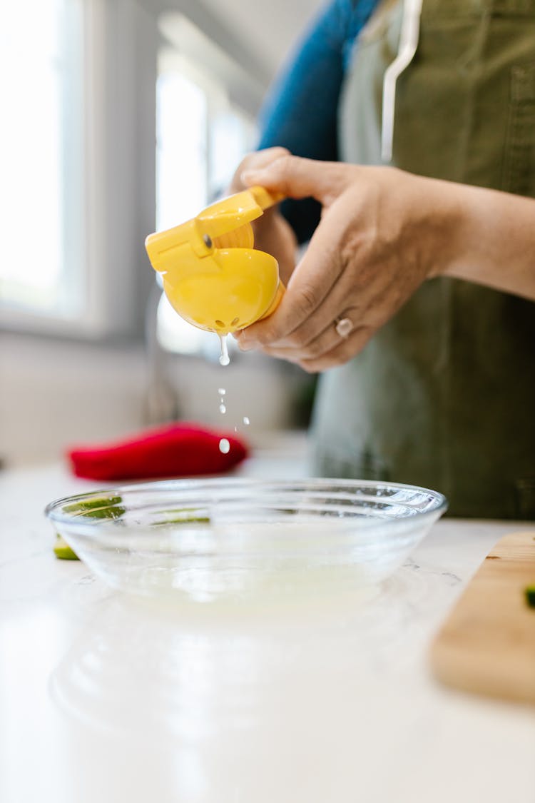 Woman Using Juicer