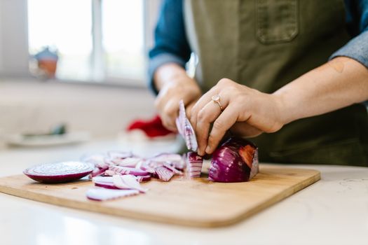 Chopping Red Onion in Close Up