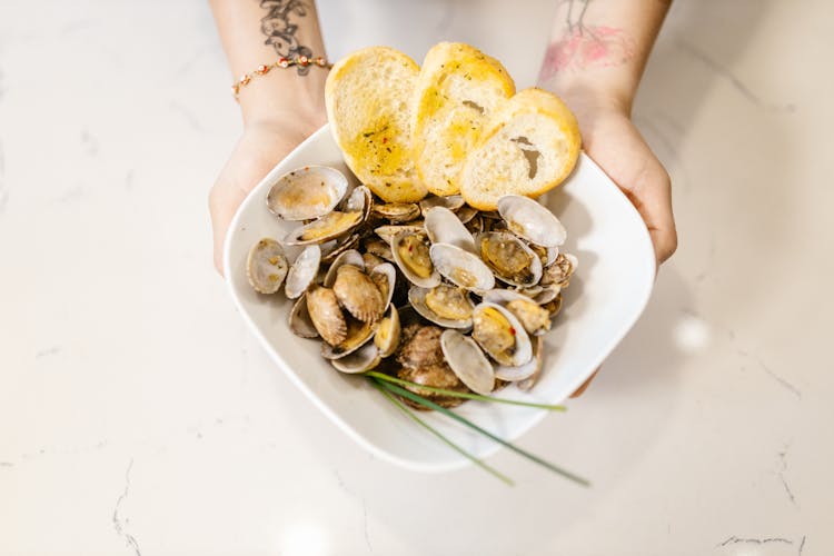 Clams And Potatoes On Dish