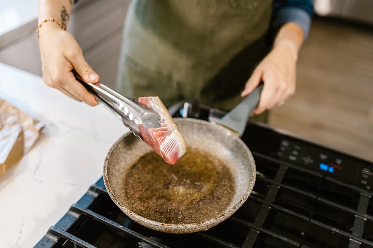 Cooking Meat In Pan