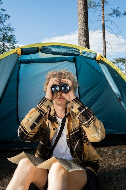 Boy Looking through Binoculars