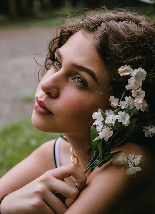 Beautiful Woman Holding Flowers